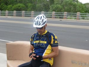 Herm contemplating his iPhone